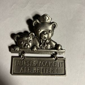Vintage JJ pin Brooch pewter nurse & bear.